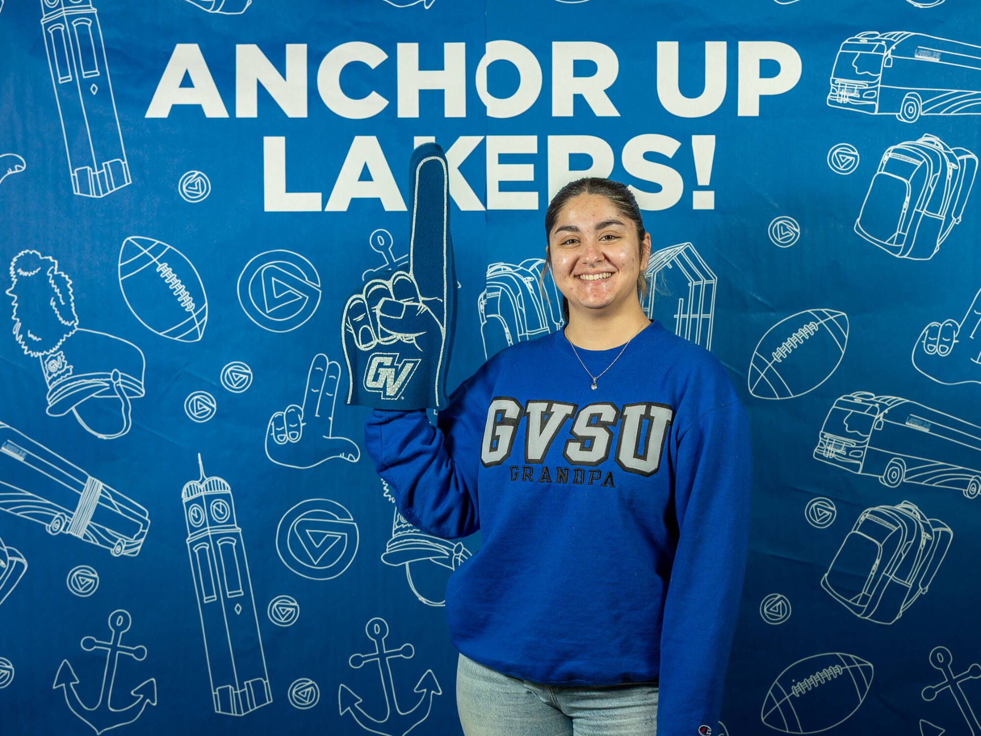 An individual holding up a GVSU foam finger